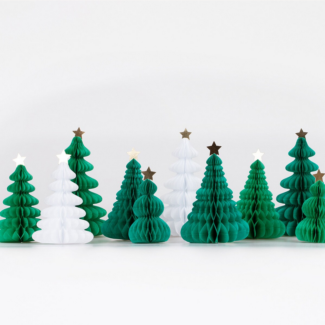 Decorative Christmas trees with stars on a white background