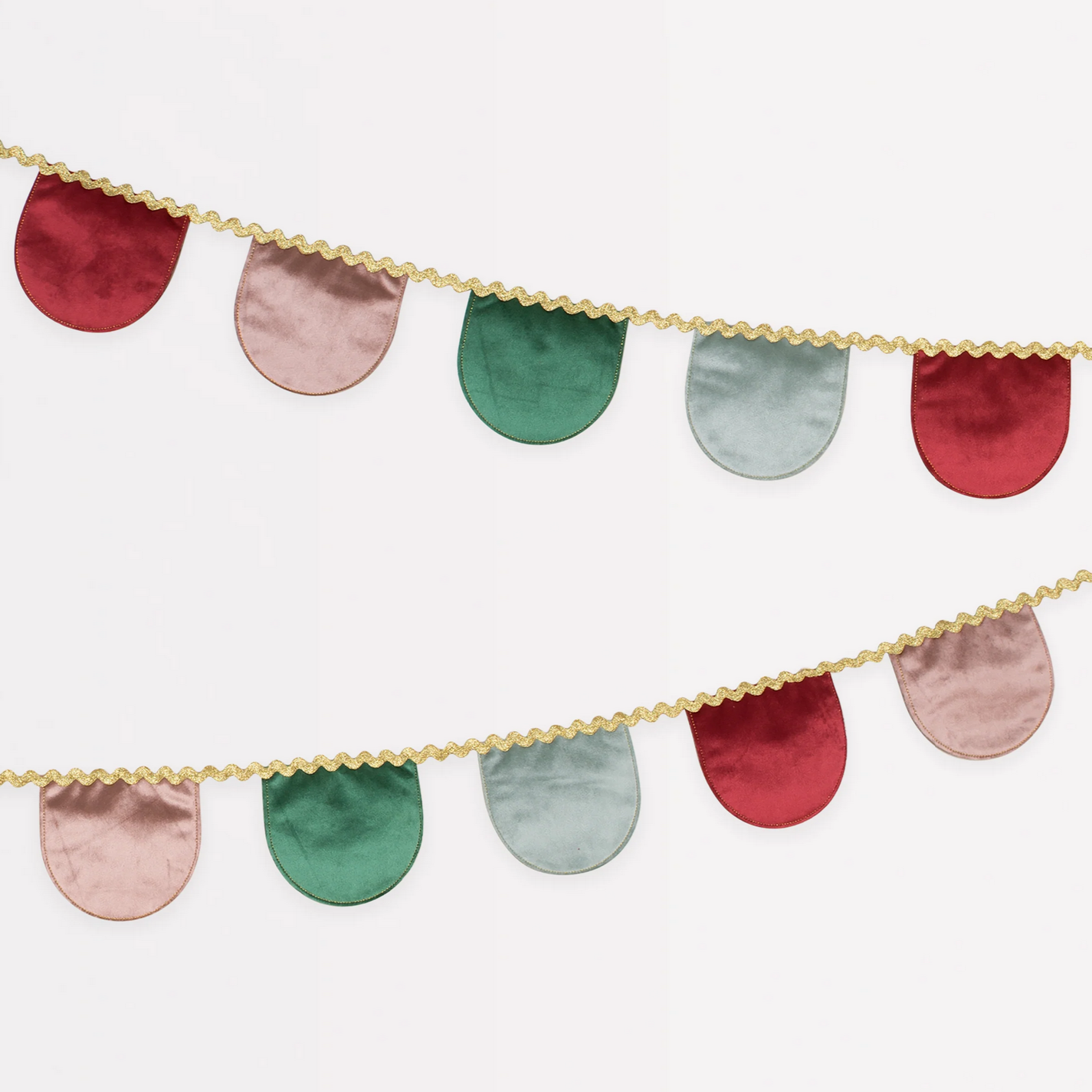 Colorful fabric banner with gold trim on a white background
