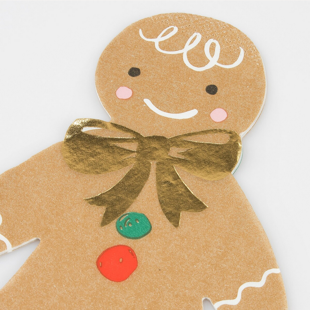 Gingerbread man napkin with a gold bow on a white background