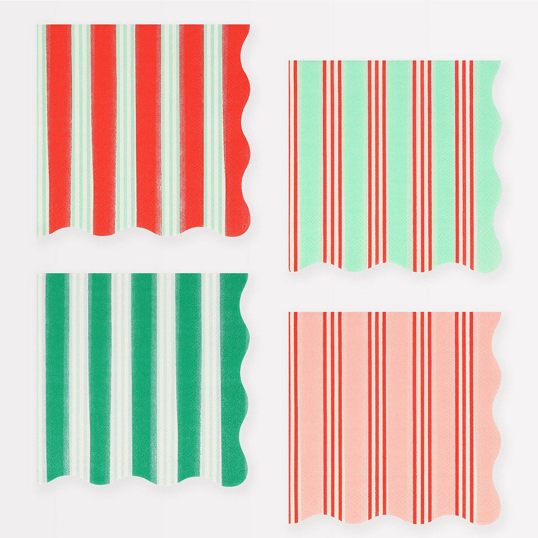 Four striped paper bags in red, green, and pink on a white background