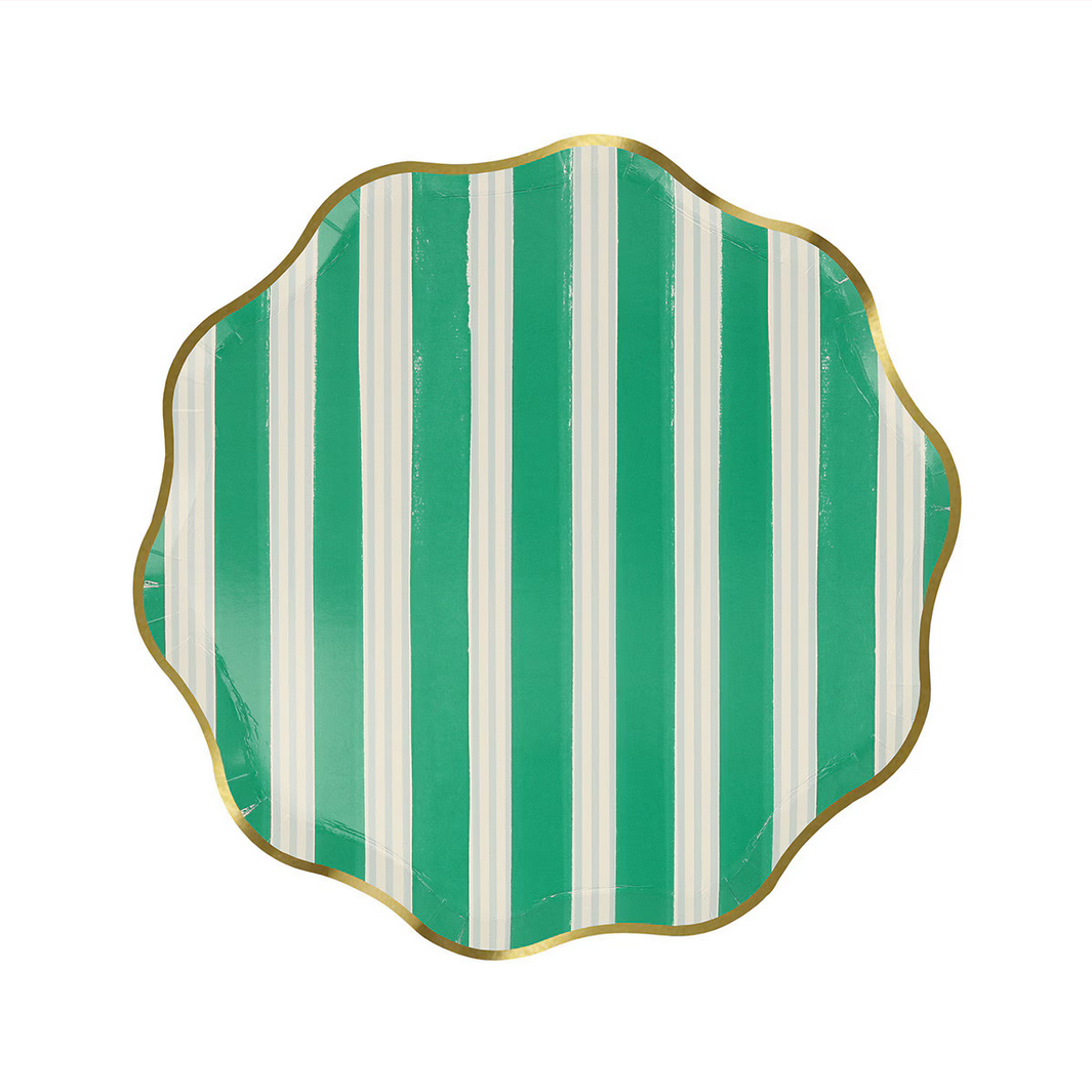 Decorative plate with green and white vertical stripes on a white background