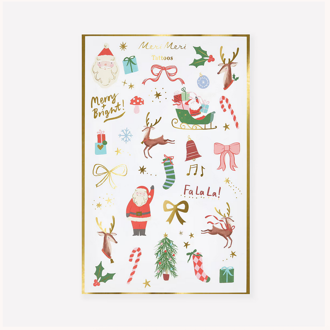 Sheet of Christmas-themed tattoos with Santa Claus, reindeer, and other holiday elements on a white background.