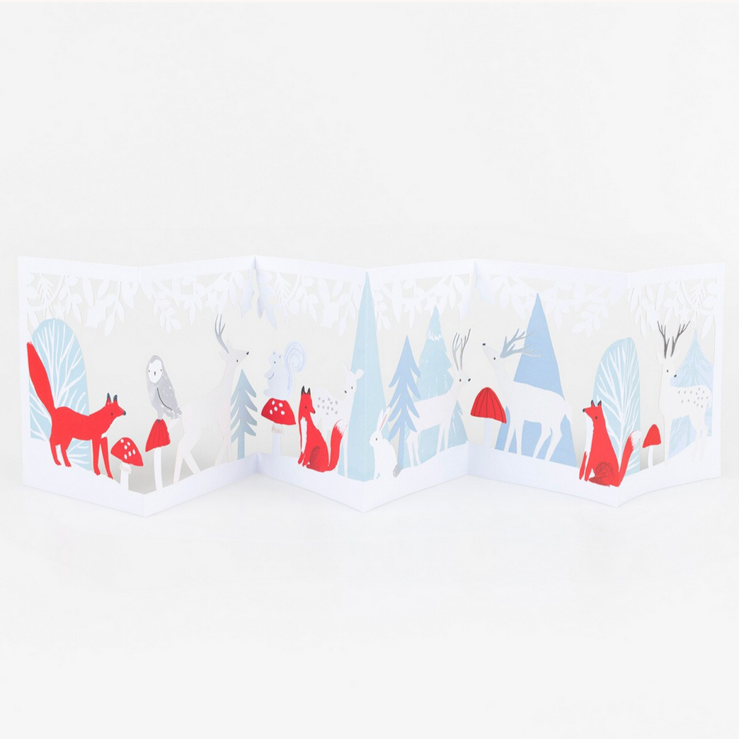 Illustration of a snowy forest with trees, foxes, and owls on a white background