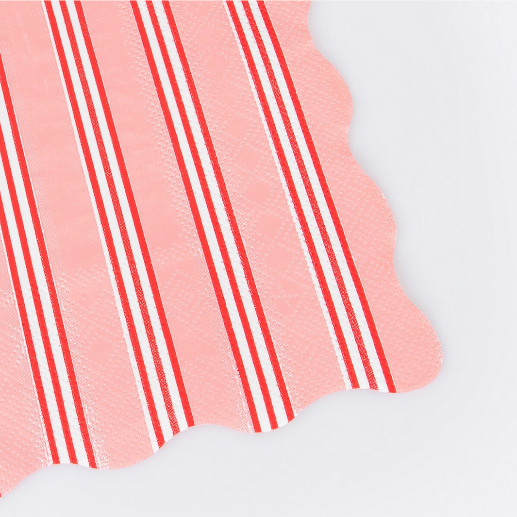 Close-up of pink NAPKIN with red stripes on a white background