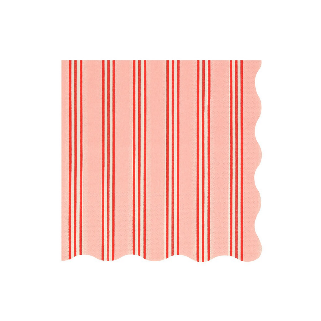 Rectangular paper napkin with red vertical stripes on a pink background