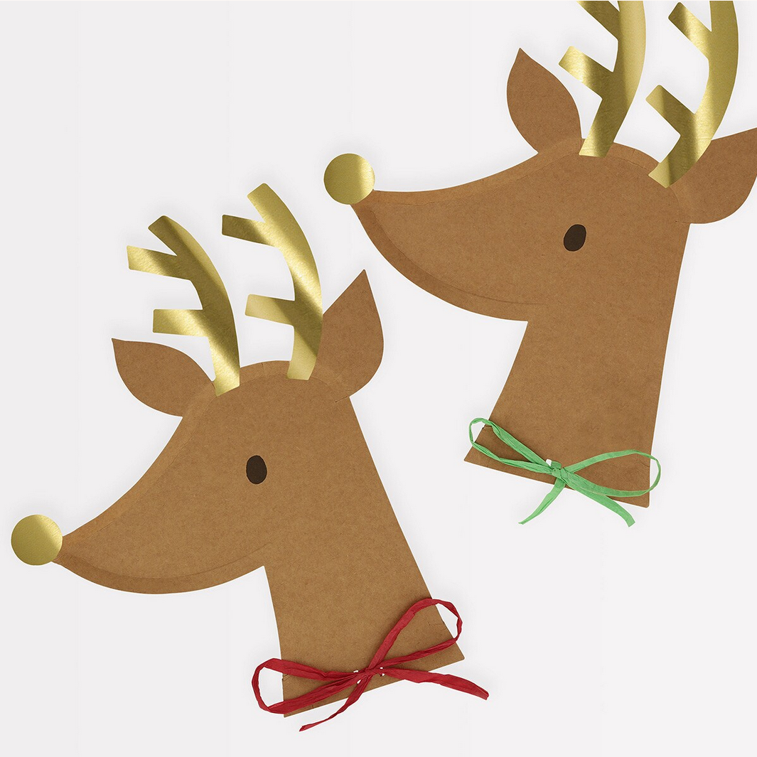 Two paper reindeer with gold antlers and red and green bows on a white background