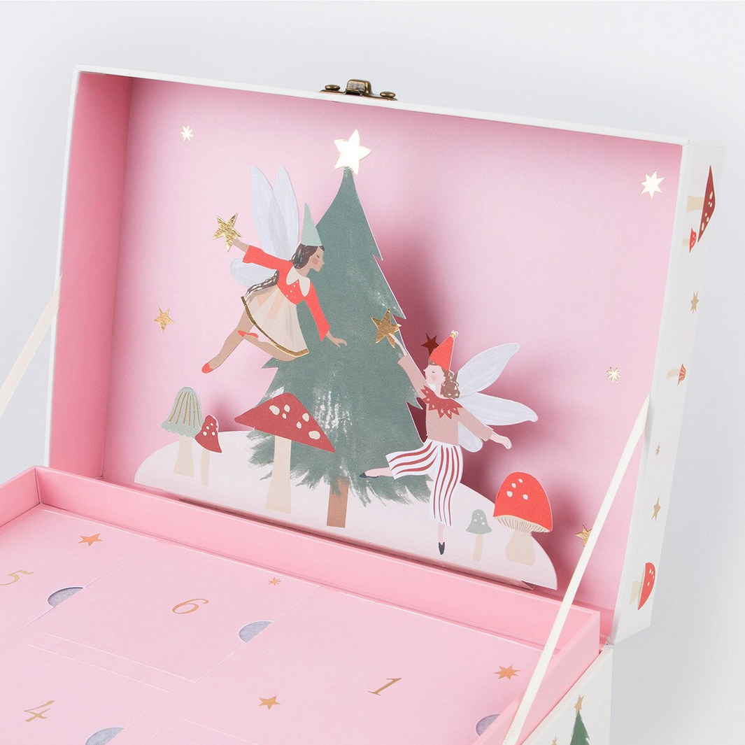 Pink box with fairy design on a white background
