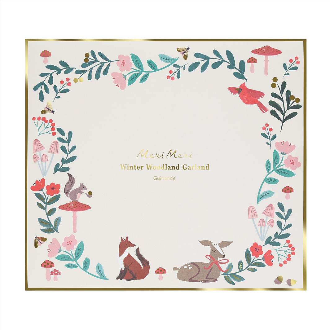Decorative paper with winter woodland design featuring animals and plants on a white background.