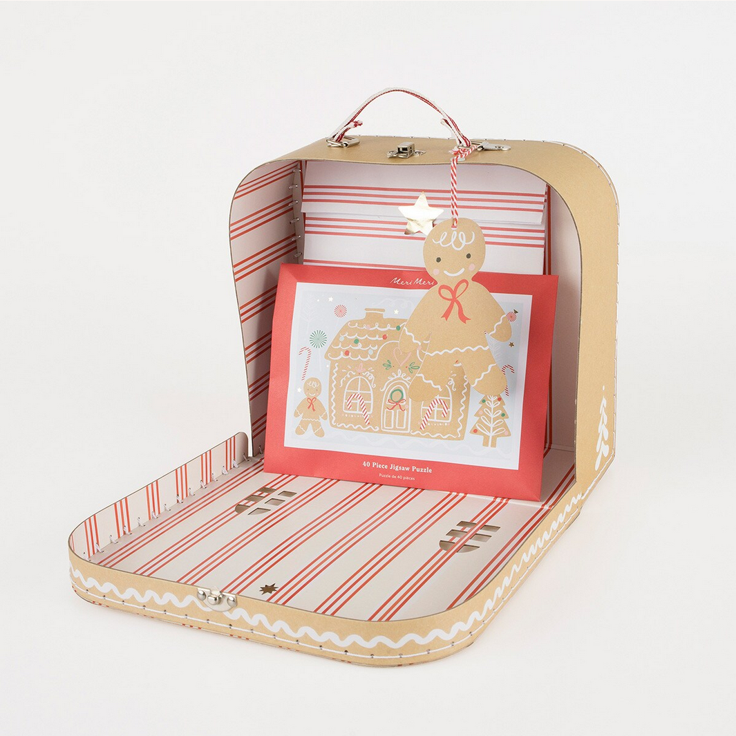 Gingerbread-themed product set in a decorative box with striped interior