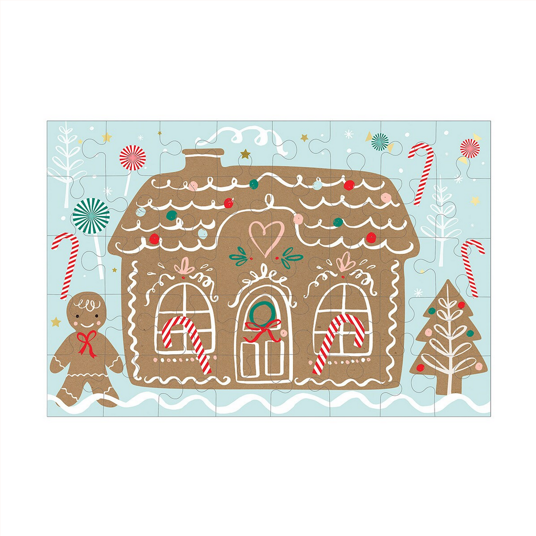 Gingerbread house illustration with candy canes and trees on a light blue background