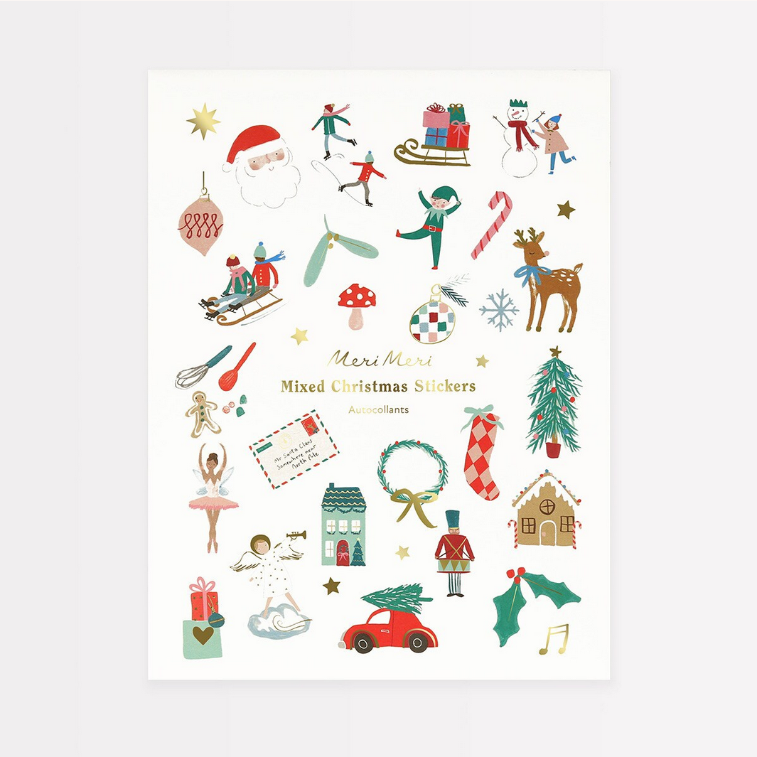 Collection of colorful Christmas-themed stickers on a white background