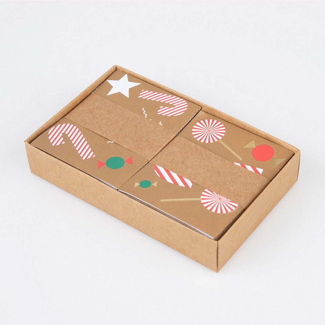 Brown cardboard box with festive illustrations on a white background