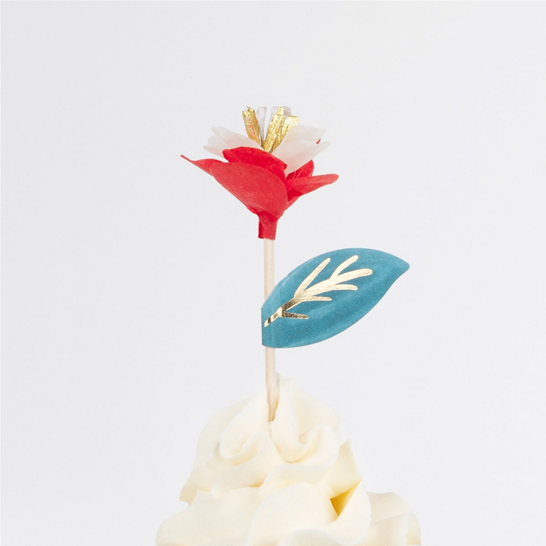 Decorative flower on a cupcake with a white background