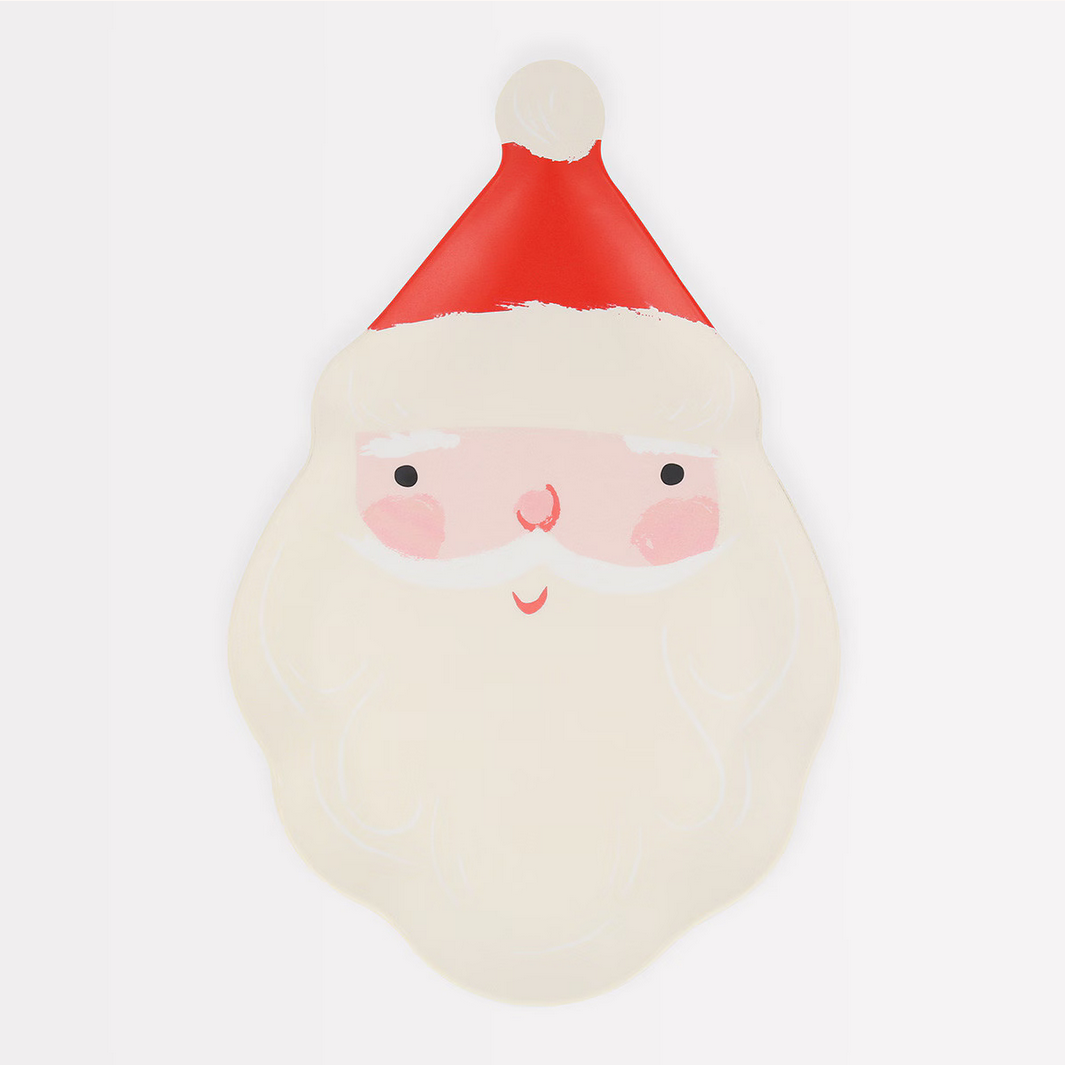 Decorative pillow shaped like a Santa Claus face on a white background