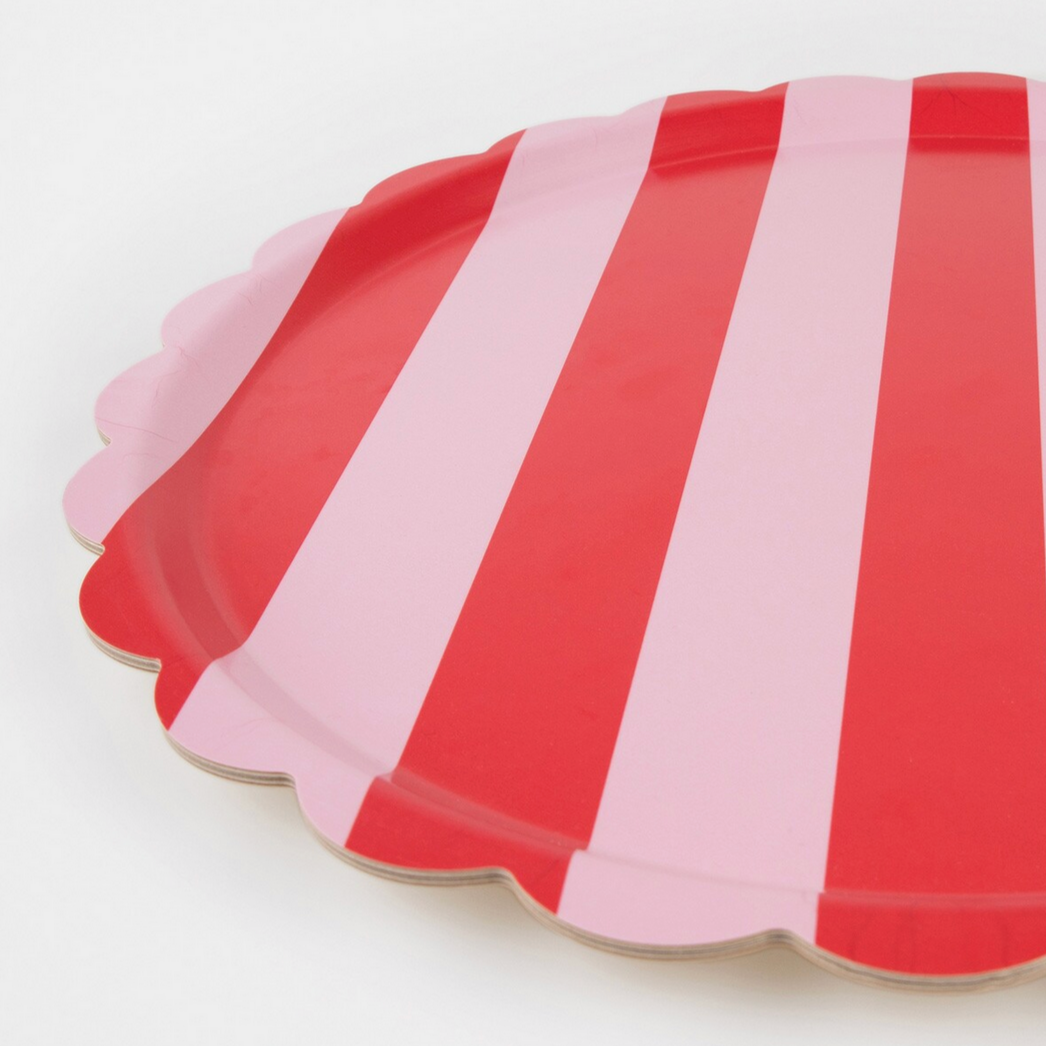 Set of red and pink striped tray on a white background