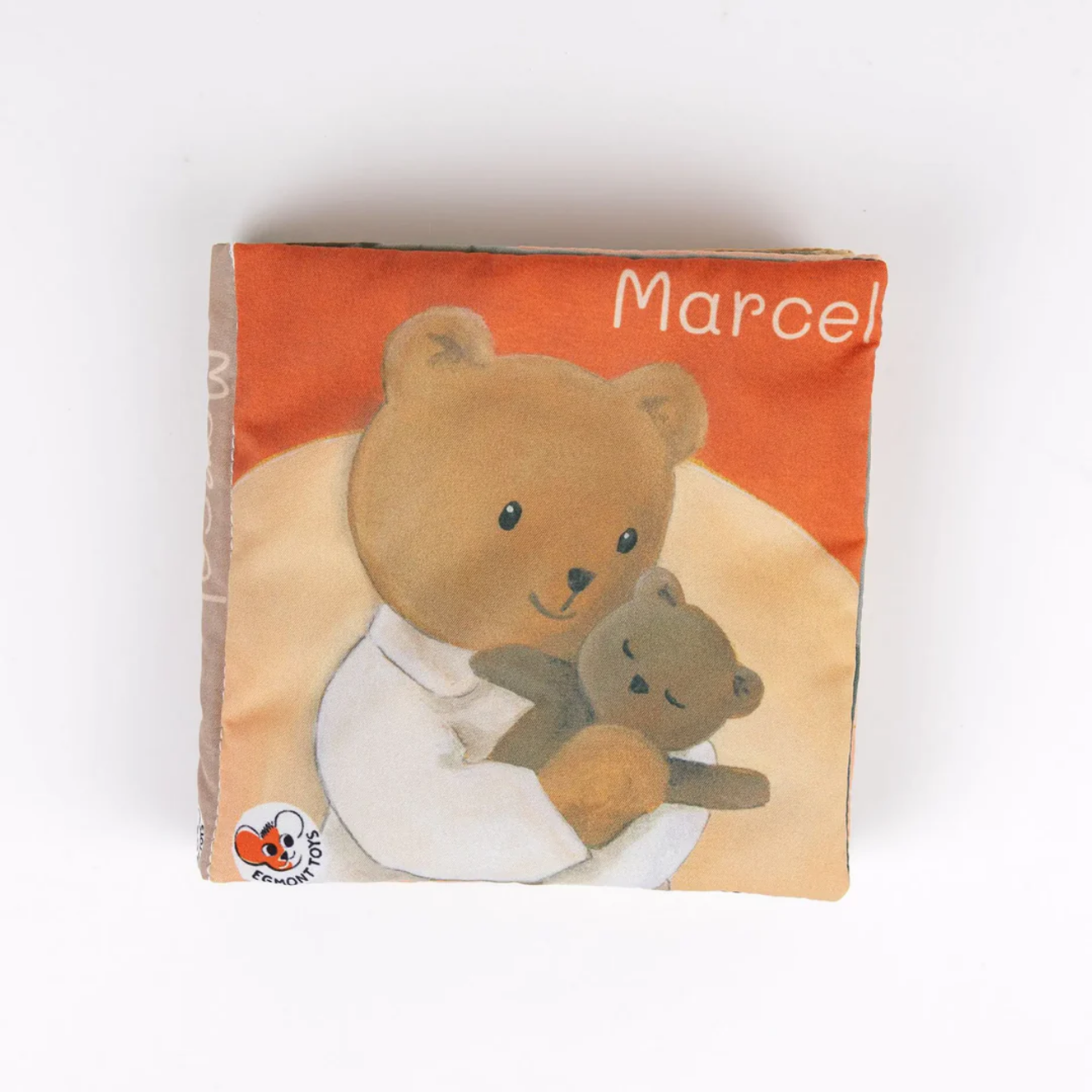 Children's book with a bear illustration and 'Marcel' on the cover, on a white background