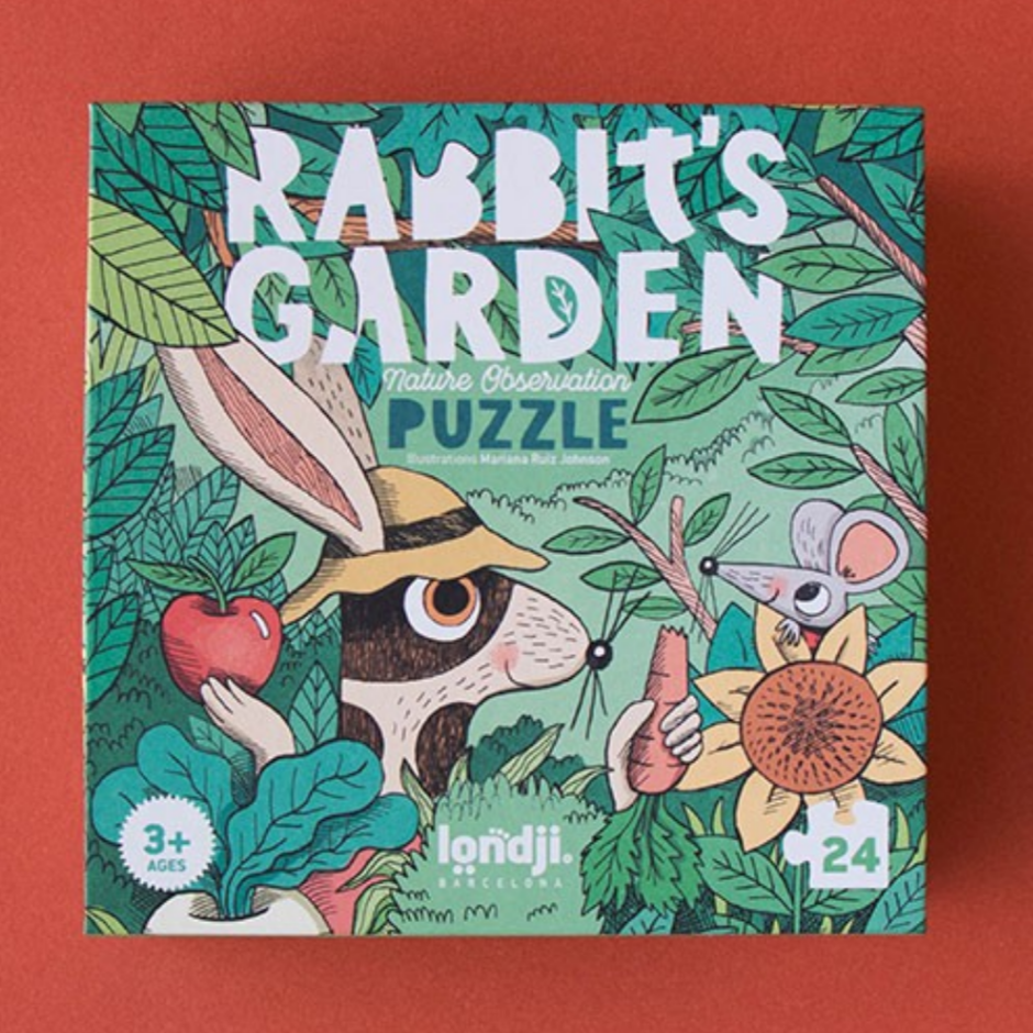 Puzzle box titled 'Rabbit's Garden' with cartoon rabbit and mouse design on a red background