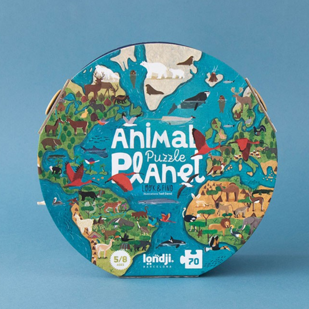 Round puzzle packaging with animal illustrations on a blue background