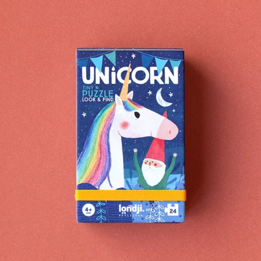 Unicorn-themed puzzle box on a red background