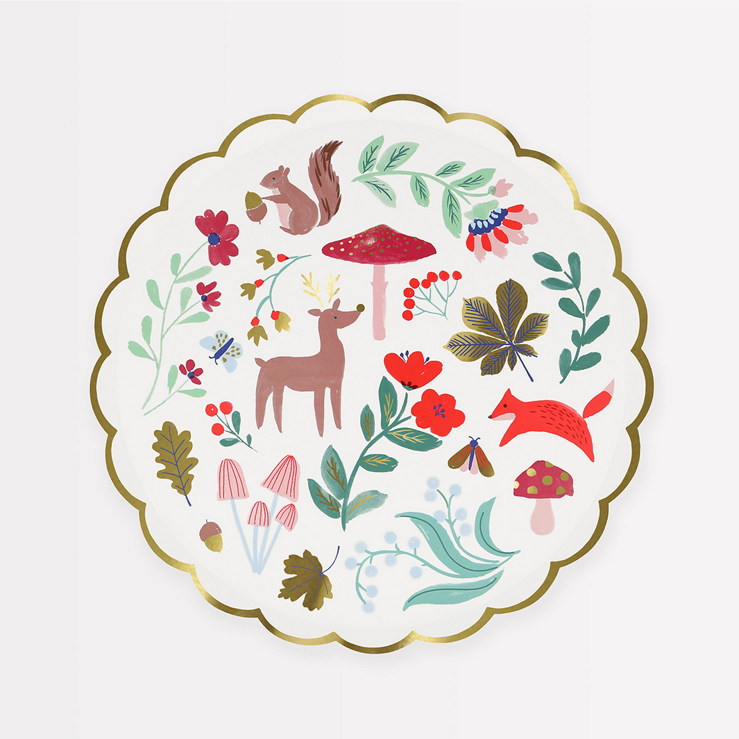 Decorative plate with forest animals and plants on a white background