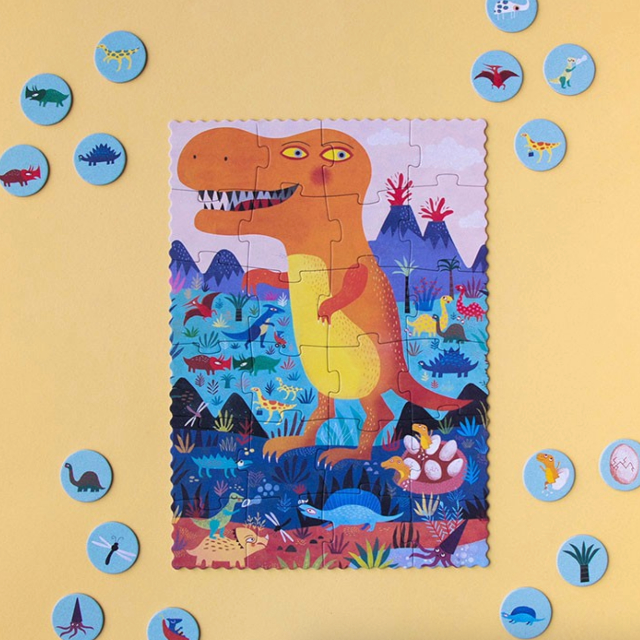 Children's dinosaur puzzle with missing pieces on a yellow background