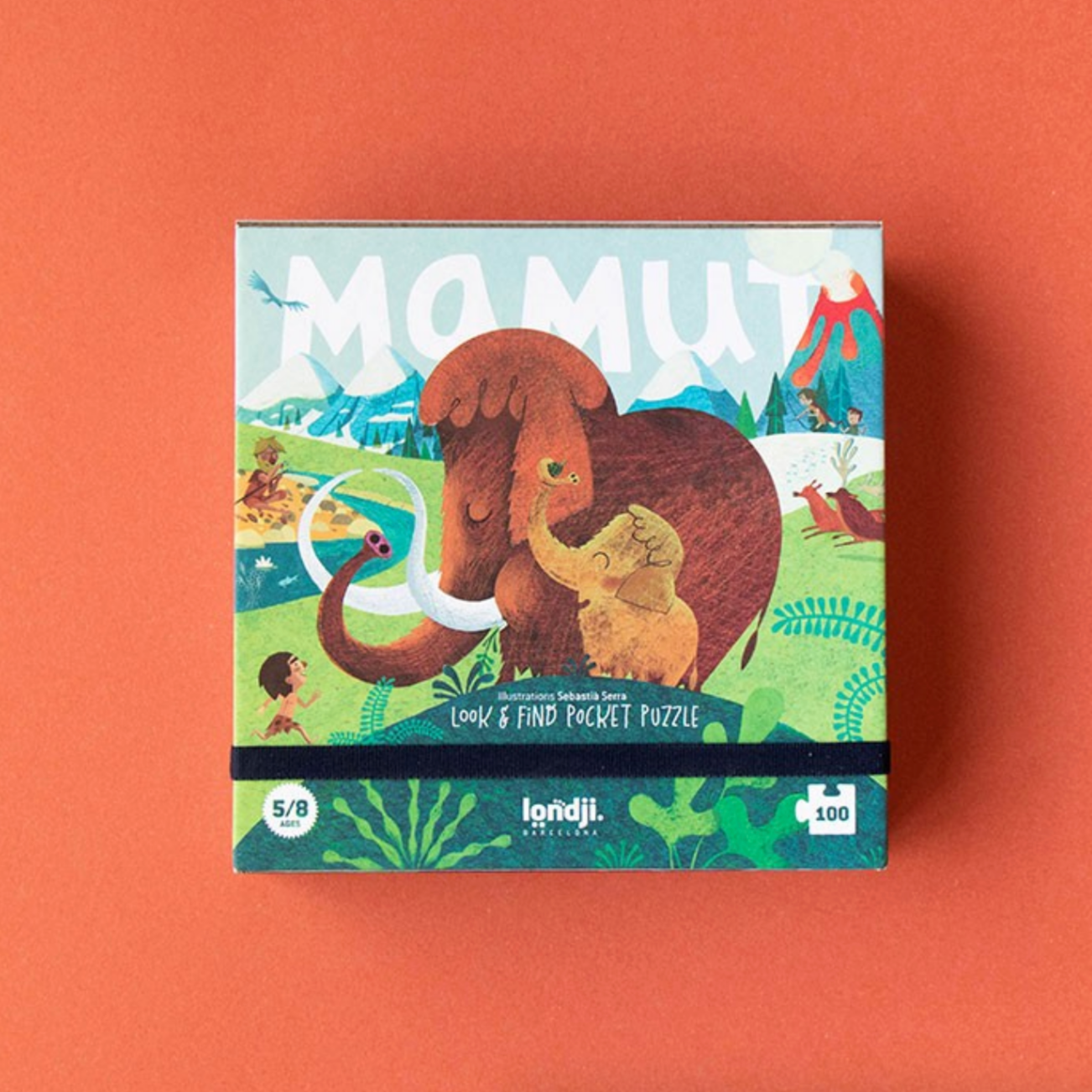 Colorful puzzle box with an elephant and child illustration on a red background