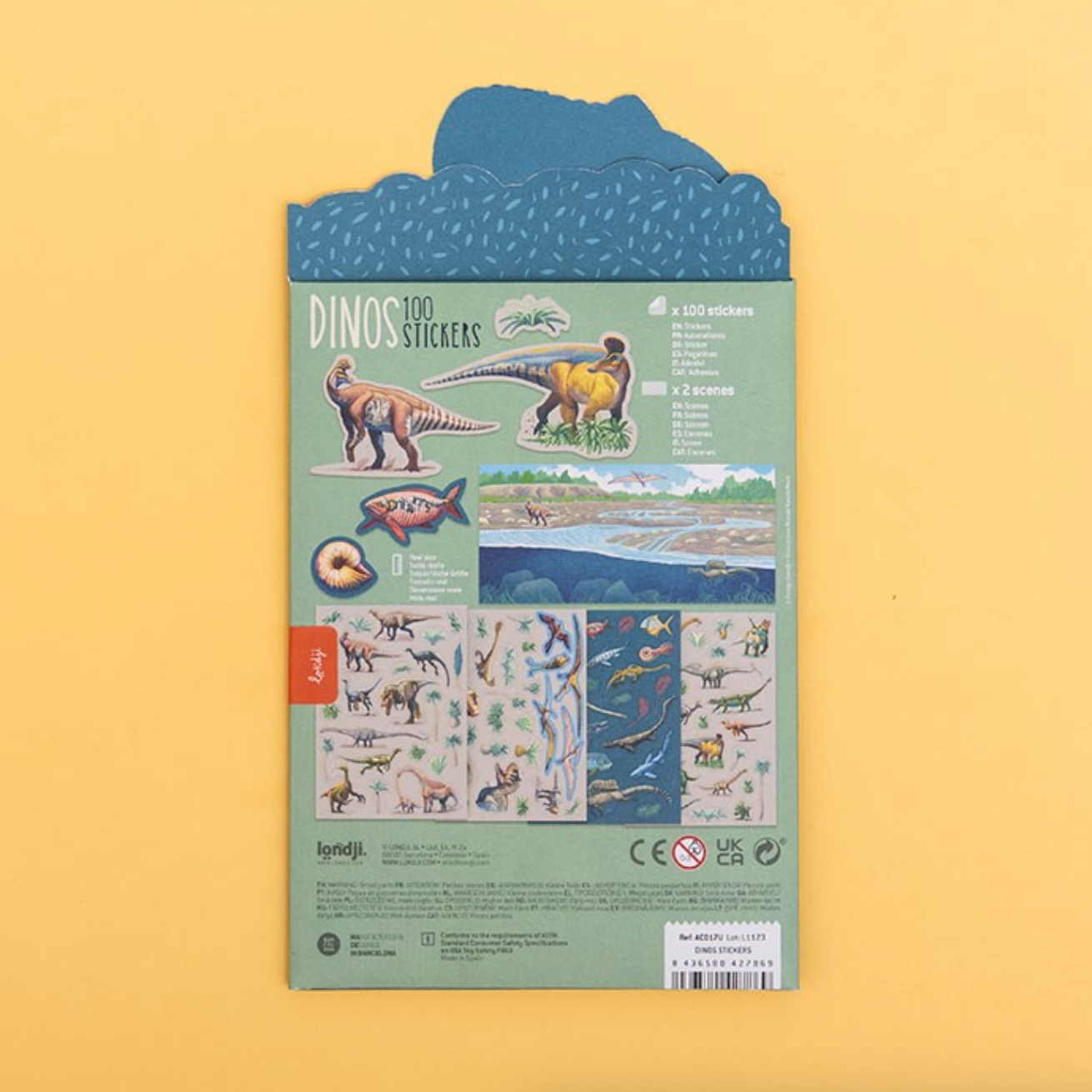 Packaging of dinosaur stickers with illustrations on a yellow background