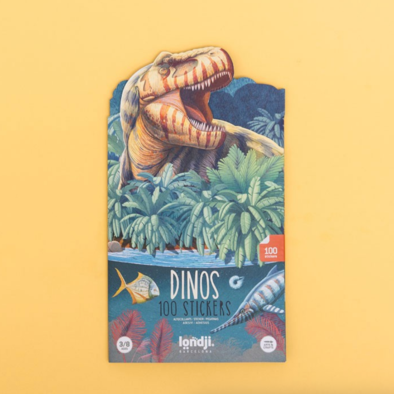 Packaging of a dinosaur-themed sticker book with a yellow background