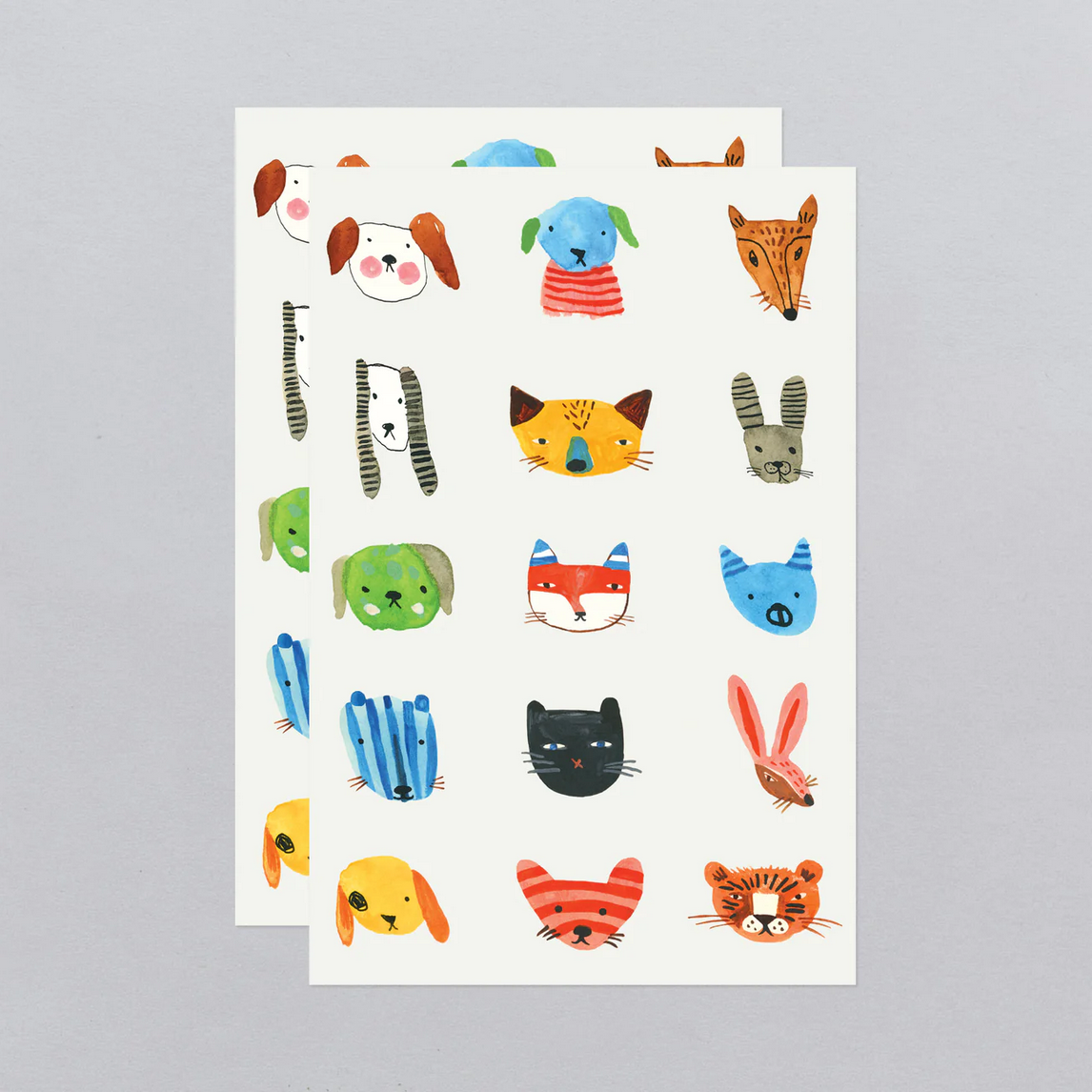 Sheet of colorful animal stickers on a gray background