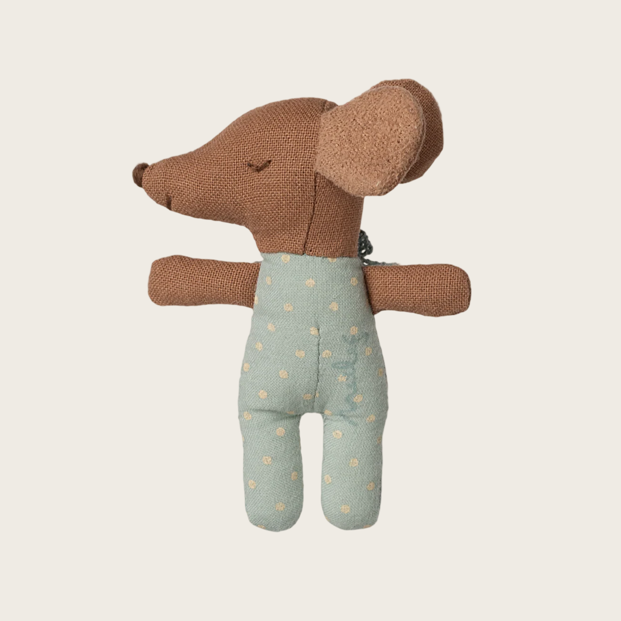 Stuffed toy mouse in a green outfit with gold polka dots 