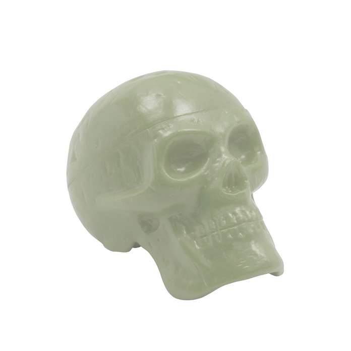 Green skull-shaped shaker on a white background