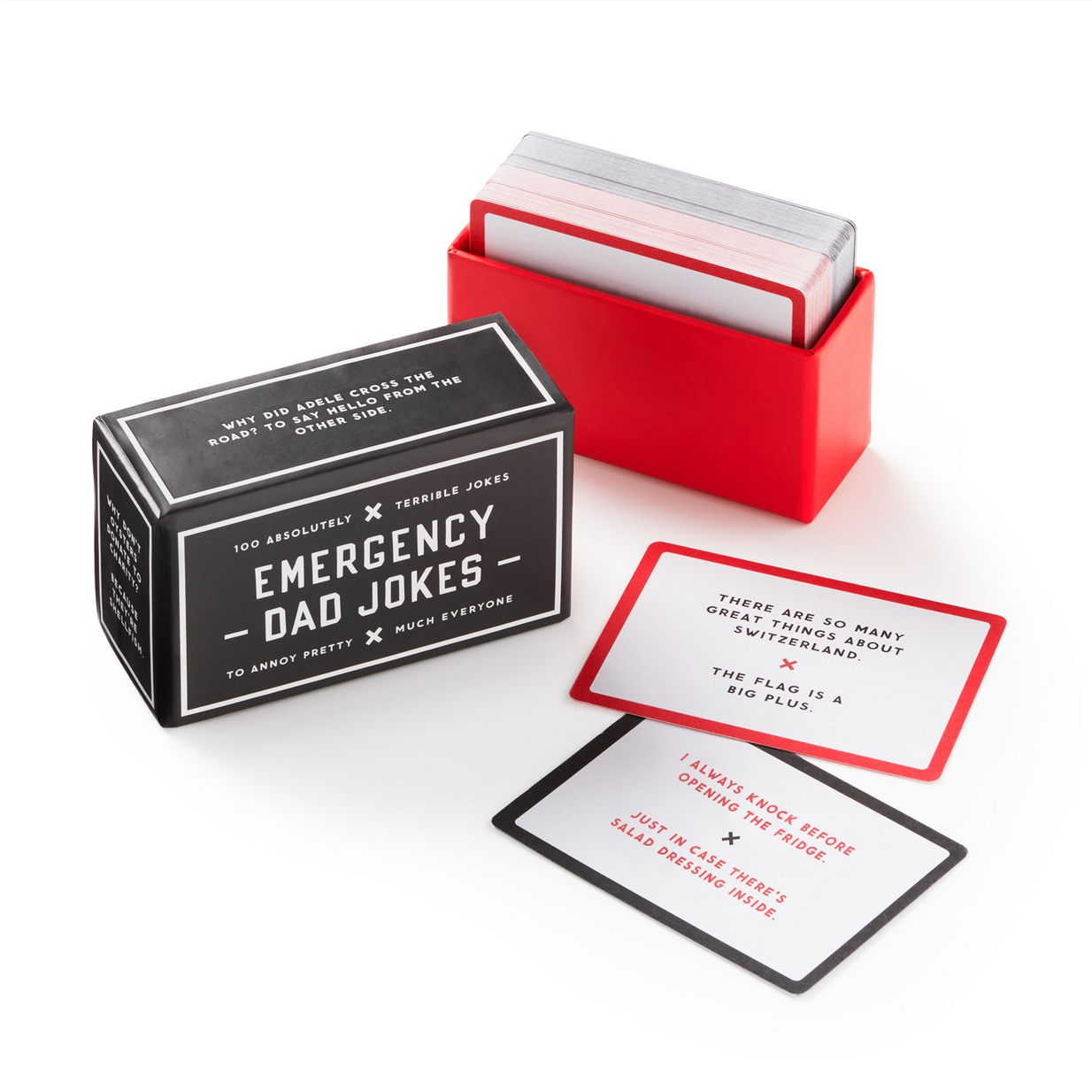 Box of 'Emergency Dad Jokes' cards with a red holder on a white background