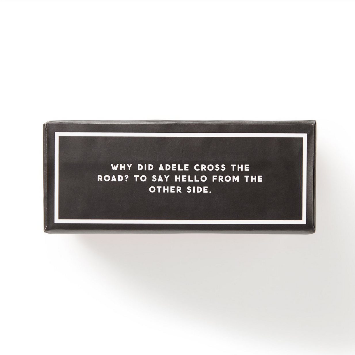 Black rectangular sign with white text on a white background