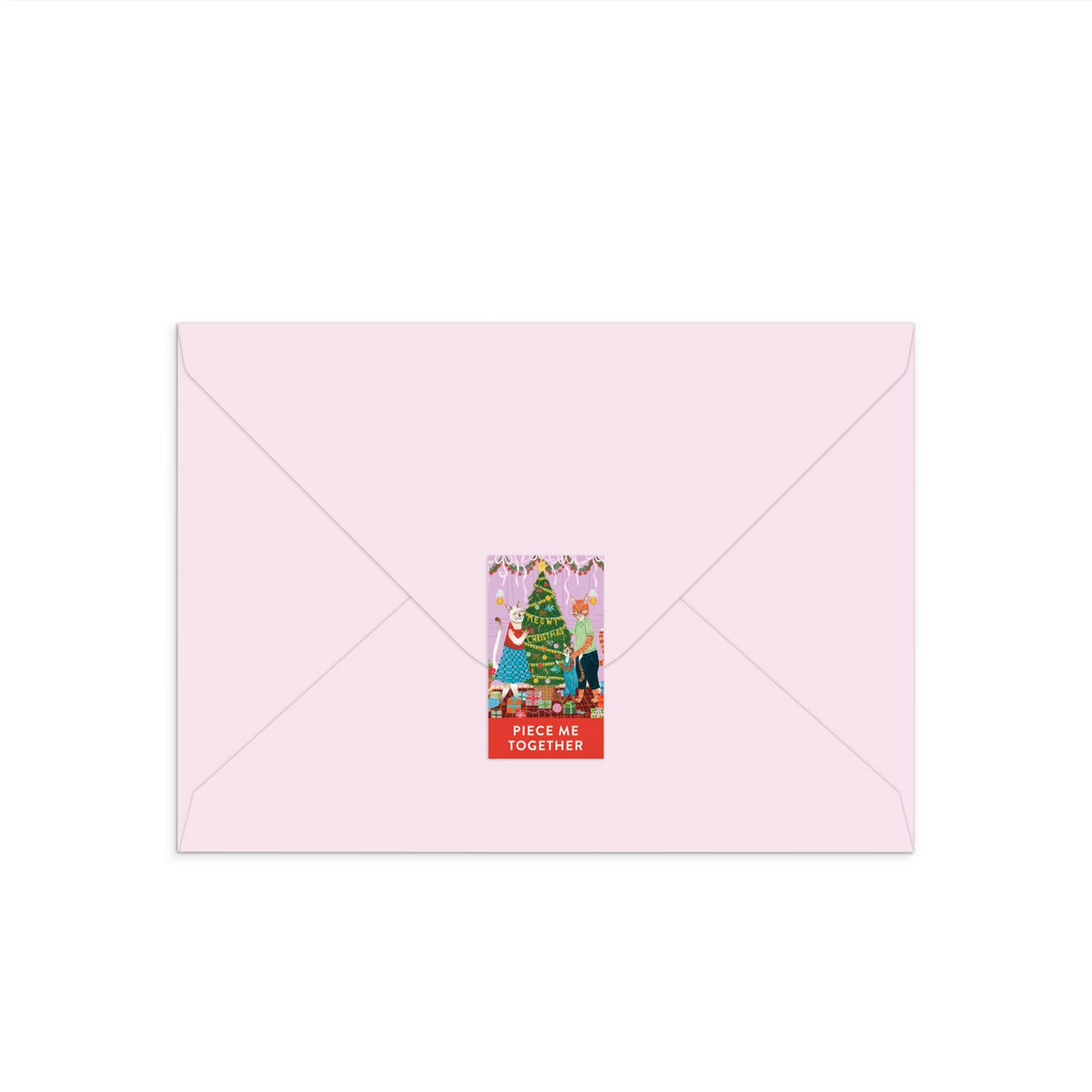 Pink envelope with a Christmas card featuring a family around a Christmas tree on a white background