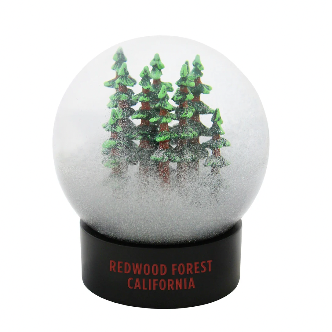 Snow globe with Redwood Forest California design on a white background