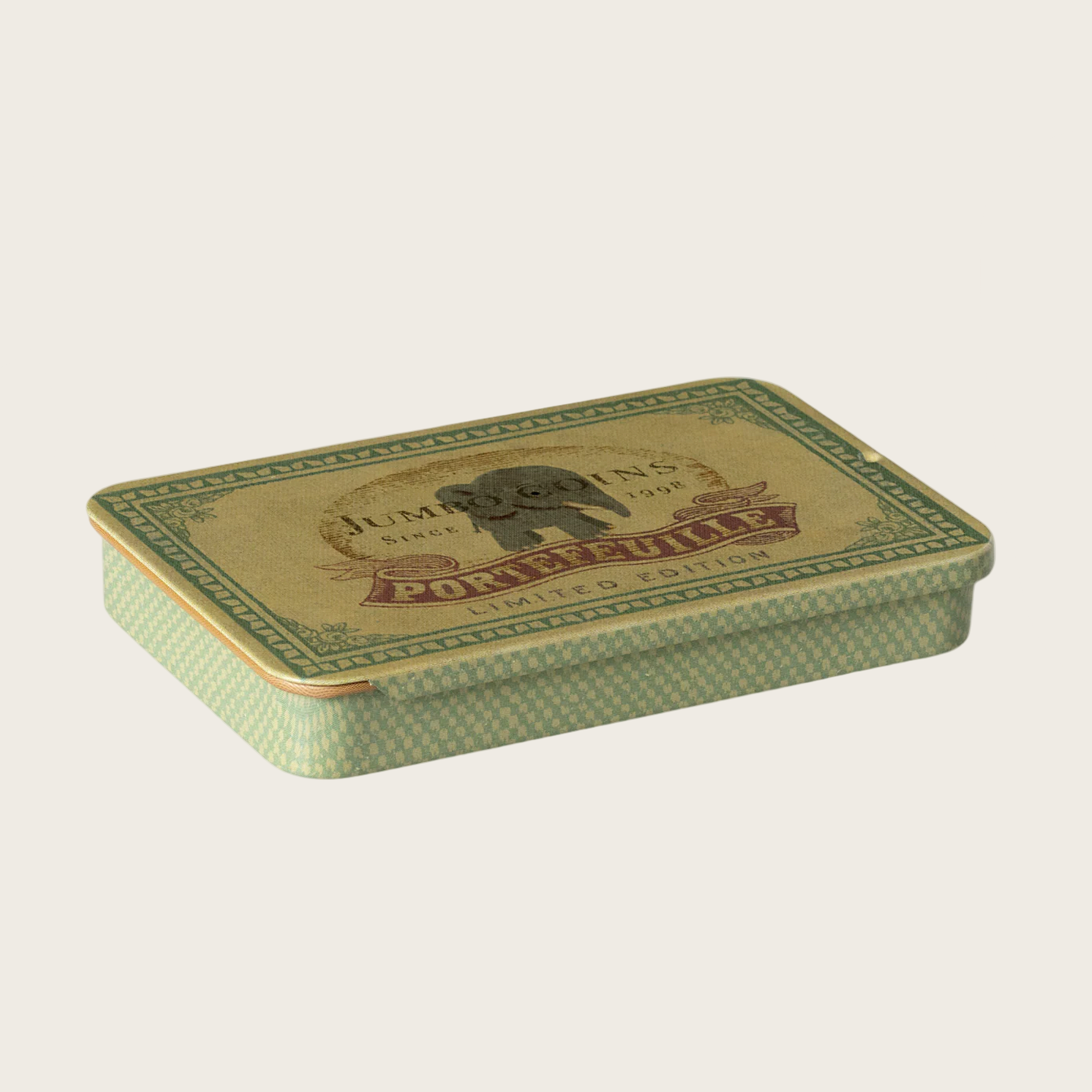 Vintage-style metal tin with decorative design 