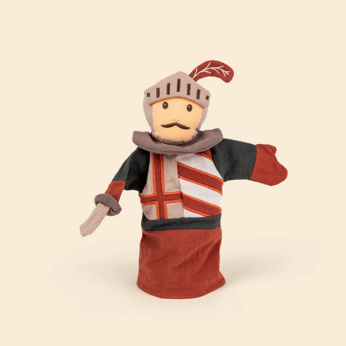 Knight puppet with a sword on a beige background