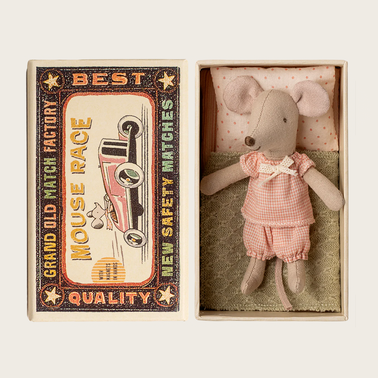 Stuffed mouse toy in a matchbox with packaging on a website page