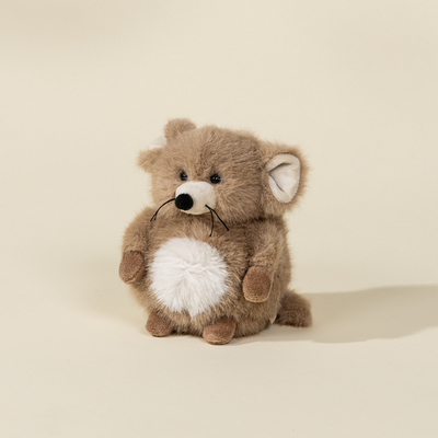 Plush toy resembling a mouse with a white belly on a beige background