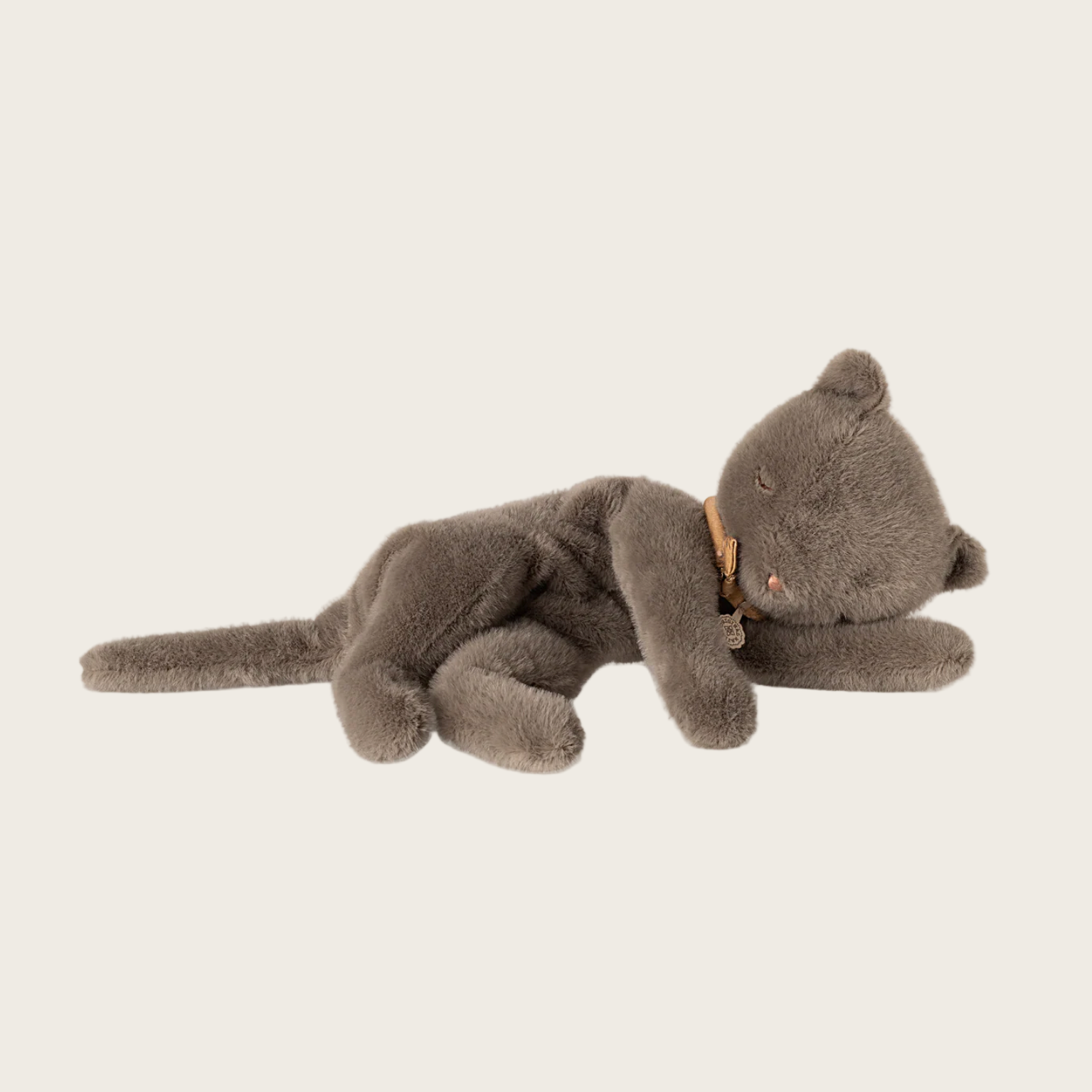 Gray plush toy resembling a cat on a website with 'Maileg' branding.