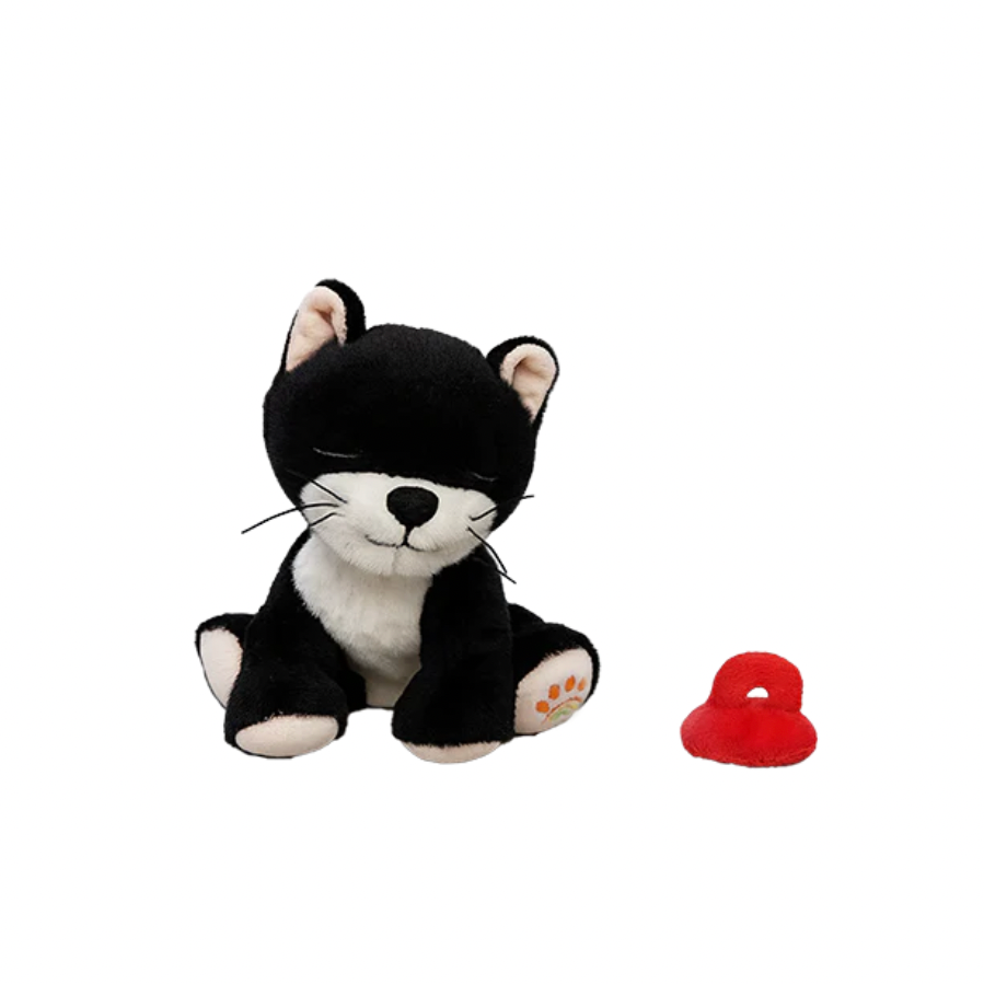 Stuffed toy cat in a black mask with a red heart on a white background