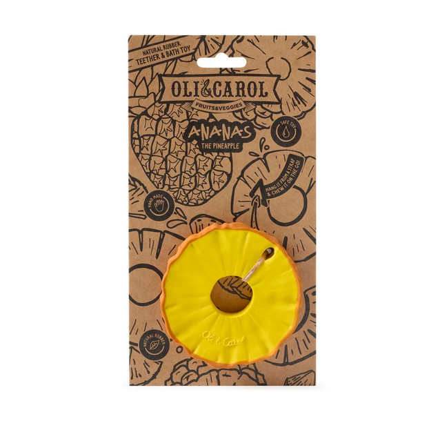Yellow pineapple-shaped toy with 'Oli & Carol' branding on a brown package.