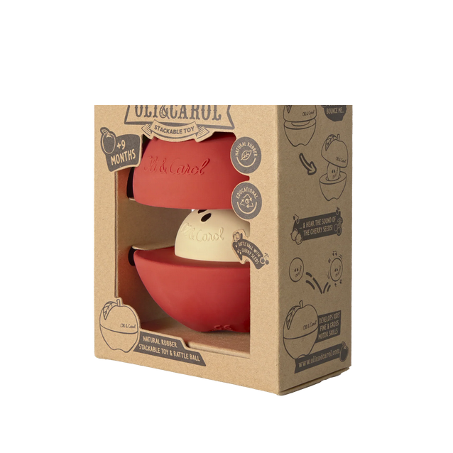 Stackable toy and rattle ball in OLI & CO packaging on a white background