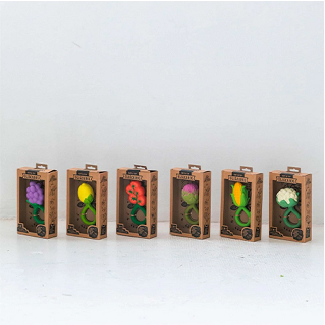 Six cardboard boxes with colorful food designs on a white background