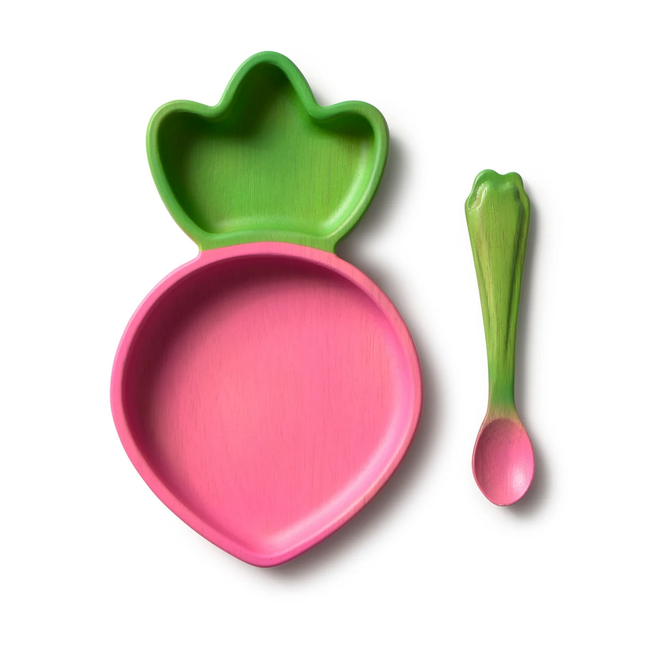 Pink bowl with green handle and matching pink spoon on a white background