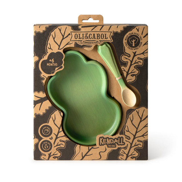 Green baby bowl and spoon set in Oli & Carol packaging on a white background