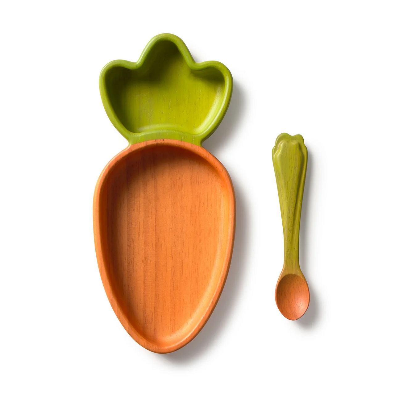 Carrot-shaped wooden plate and spoon set on a white background
