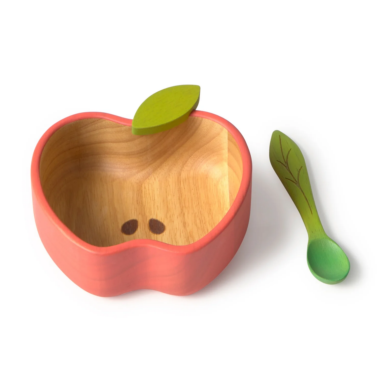 Wooden apple-shaped bowl with a green leaf and matching spoon on a white background