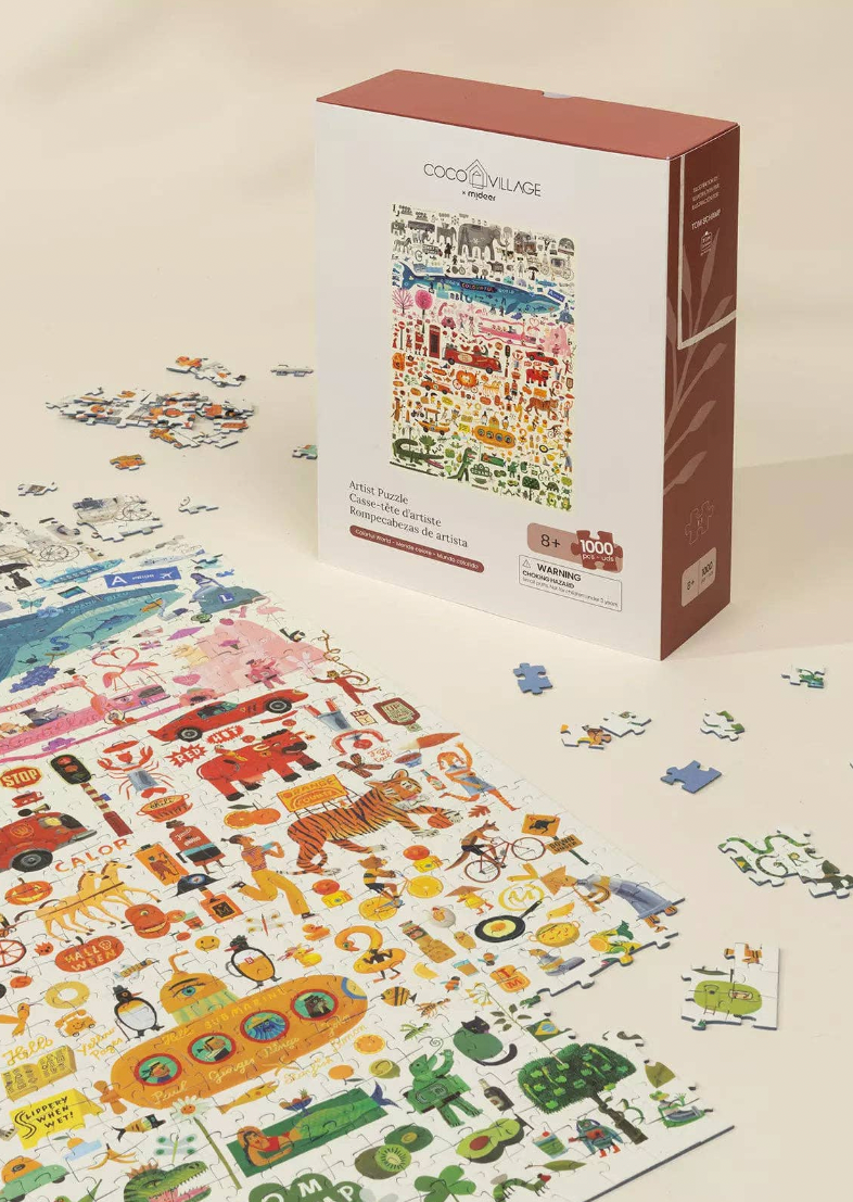 Jigsaw puzzle with pieces and packaging on a white background