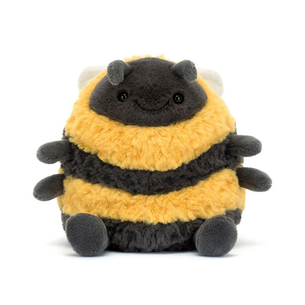 Plush bee toy with a black face on a white background